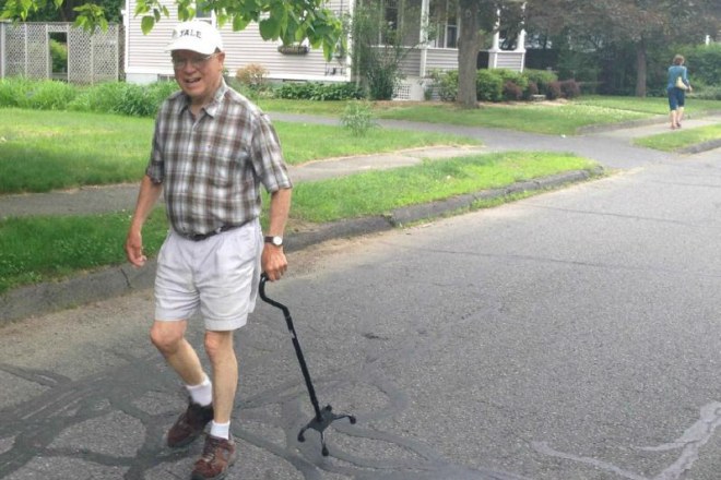 Gene walks in the middle of the street