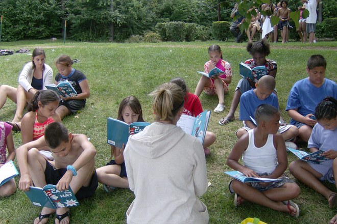 Children reading Dr. Suess at Hasbro Summer Learning Initiative program